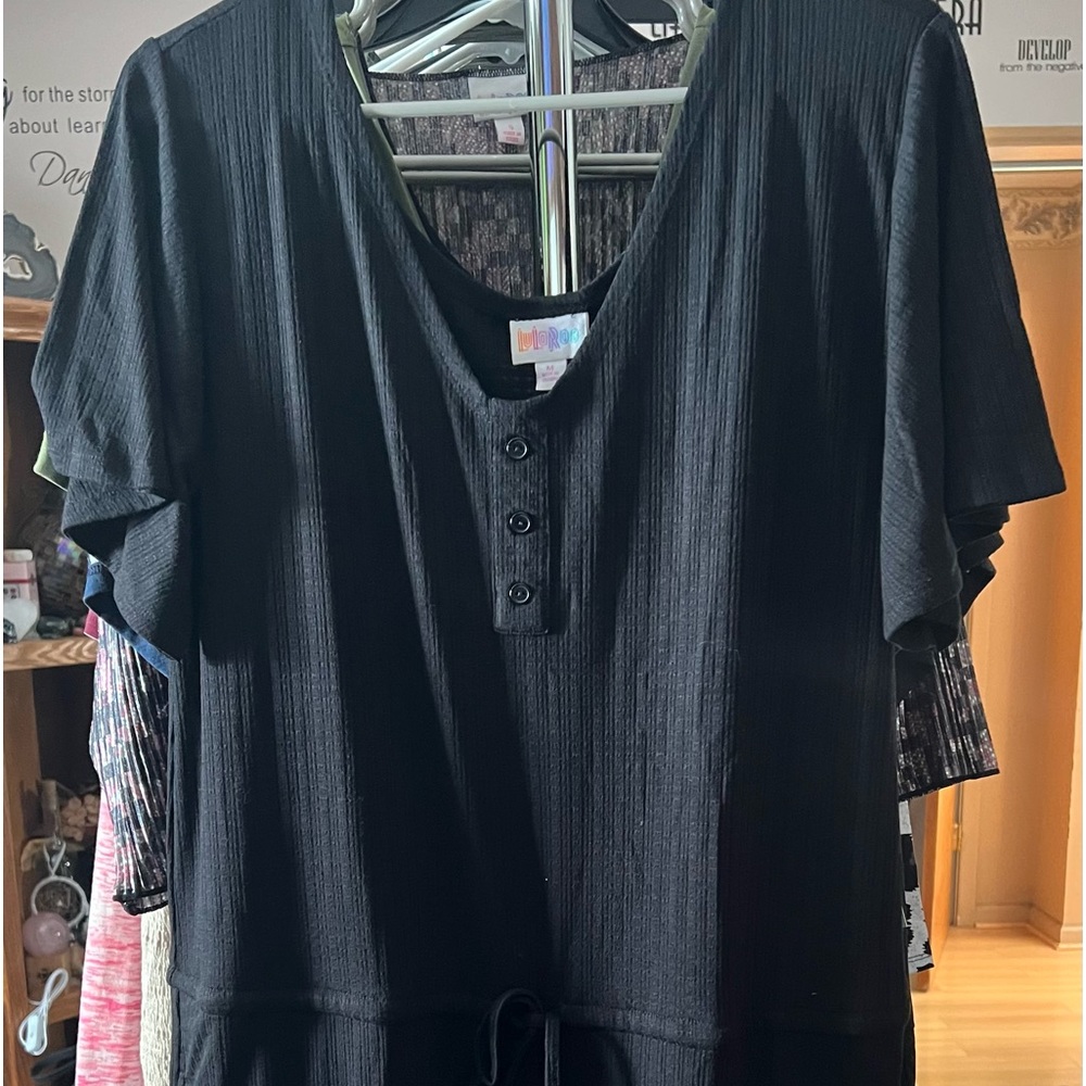 Black LuLaRoe Xanthe romper, size M (8-10). New with tags